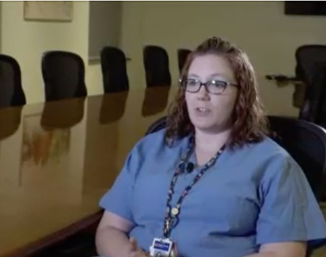 Healthcare worker speaking in conference room